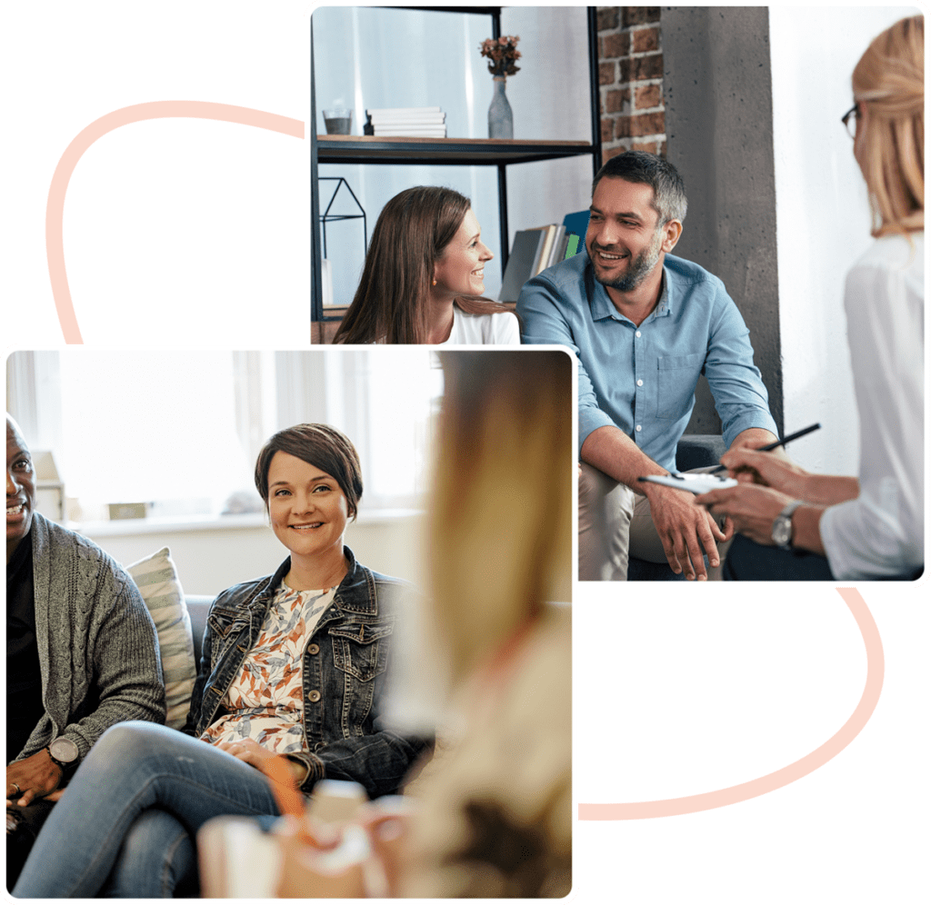 Couples in a therapy session smiling.